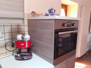 Kuchyň nebo kuchyňský kout v ubytování Acero Rosso