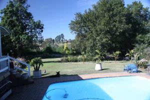 The swimming pool at or close to Meander In