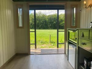 Zahrada ubytování Tiny house, pipowagen onder de kastanje