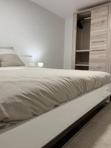 Postel nebo postele na pokoji v ubytování L'appart du RIED