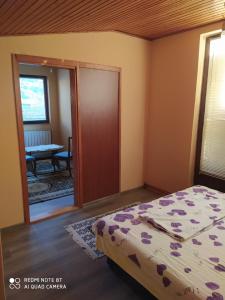 Letto o letti in una camera di Apartman Mickey