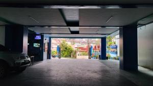 an empty parking garage with a car parked in it at Finteo Skylands in Baguio