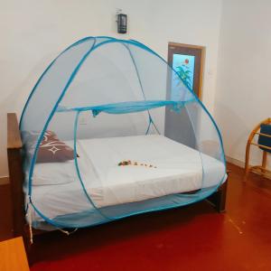 Postel nebo postele na pokoji v ubytování Jaana Guest