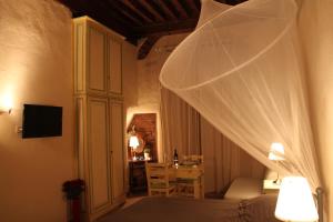 Ένα ή περισσότερα κρεβάτια σε δωμάτιο στο Residenza Sant' Andrea
