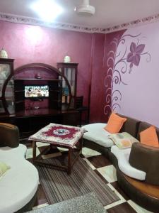 A seating area at App11- BELAL - Enjoy the privacy of staying in a quiet apartment with free Wi-Fi as your complete second home in the heart of Hurghada