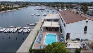 an aerial view of a marina with boats in the water at Hotel Oleandro in Cassano Jonio