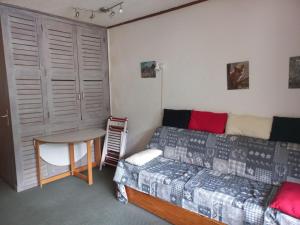 Säng eller sängar i ett rum på Studio Tignes, 1 pièce, 3 personnes - FR-1-449-38