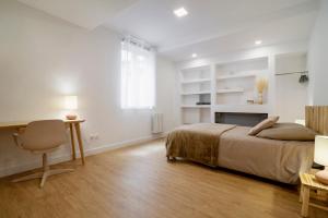 Ein Bett oder Betten in einem Zimmer der Unterkunft Magnifique appartement plein centre, calme, Netflix