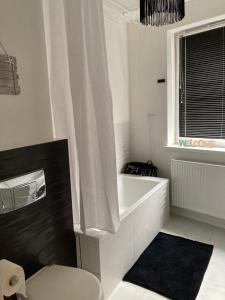Ένα μπάνιο στο Apartament Sobieskiego +16 φωτογραφίες