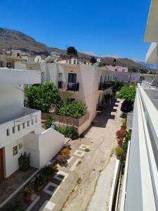 a view from the balcony of a building at Sofia Studios & Apartments in Georgioupolis