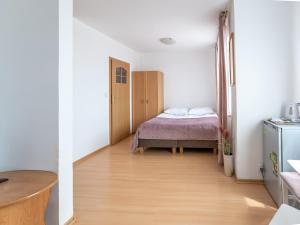 Postel nebo postele na pokoji v ubytování Amber Dom Gościnny
