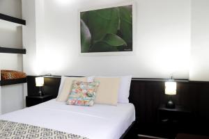 Voodi või voodid majutusasutuse Hotel-Restaurante Ancora toas
