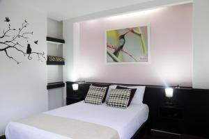 Voodi või voodid majutusasutuse Hotel-Restaurante Ancora toas