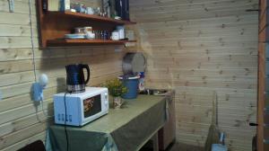 Kuchyň nebo kuchyňský kout v ubytování Kalamehe Farmstay