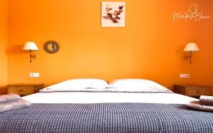 Ein Bett oder Betten in einem Zimmer der Unterkunft B-Rent Mariposa Private Garden