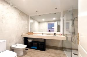 Ein Badezimmer in der Unterkunft B-Rent Mariposa Private Garden