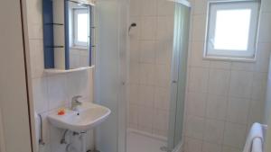 Koupelna v ubytování Apartments Barić Kučište + 37 fotografií