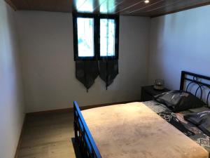Postel nebo postele na pokoji v ubytování Le Flamboyant avec piscine chauffée 30° et Jacuzzi