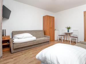 Postel nebo postele na pokoji v ubytování Amber Dom Gościnny