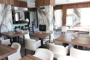 A seating area at Milano Hotel
