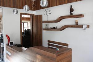A kitchen or kitchenette at Milano Hotel