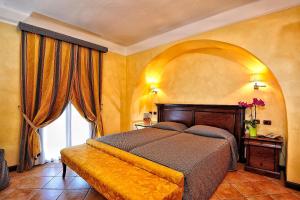 Кровать или кровати в номере Hotel Arbatasar