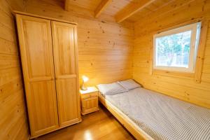 Posteľ alebo postele v izbe v ubytovaní Kotwicownia + 10 fotografií