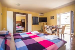 Postel nebo postele na pokoji v ubytování Studio apartman Second Serve