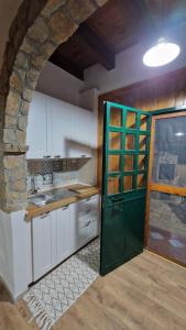Kuchyňa alebo kuchynka v ubytovaní Casa vacanze La Posada