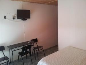 TV a/nebo společenská místnost v ubytování Tierras Blancas Nihuil
