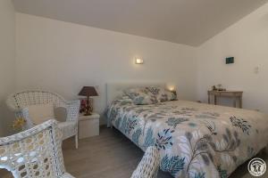 Un ou plusieurs lits dans un hébergement de l'établissement COSY LODGE TOULOUSE