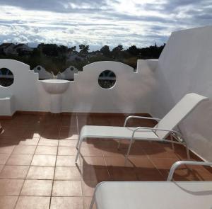 Balkon lub taras w obiekcie SEA VIEW Holiday Home in Marbella Resort