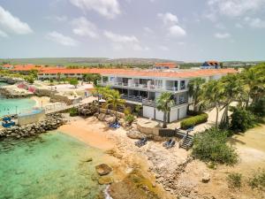 an aerial view of a resort on the beach at Den Laman - Balloonfish in Kralendijk