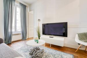 Zdjęcie z galerii obiektu Appartement cosy chaleureux Proche Paris - Defense w mieście Suresnes