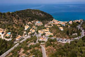 an aerial view of a small town on a hill at Santa Marina Hotel in Agios Nikitas