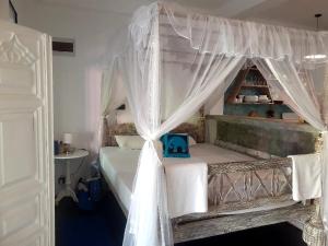 Ένα ή περισσότερα κρεβάτια σε δωμάτιο στο Villa summertime Mirissa