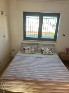 Postel nebo postele na pokoji v ubytování Casa Carlucci + 14 fotografií