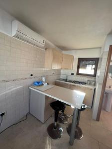 Cucina o angolo cottura di Casa Carlucci