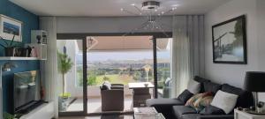 A seating area at Baviera Hills Holiday Apartment