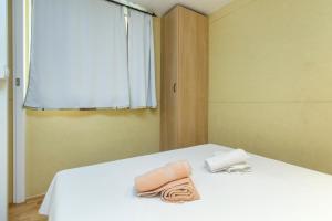 Postel nebo postele na pokoji v ubytování Guest house Punta