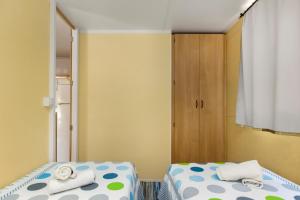 Postel nebo postele na pokoji v ubytování Guest house Punta