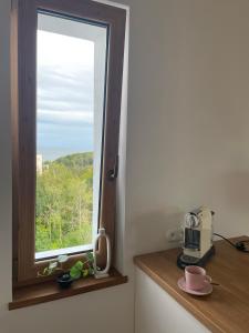 Príslušenstvo na prípravu kávy alebo čaju v ubytovaní cosy condo 5 min do plaży z balkonem Gdynia