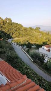 a view of a winding road from a roof at Alexandra's Studios in Kechria