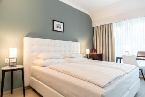 Letto o letti in una camera di Hotel Spiess & Spiess