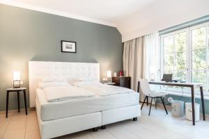 Letto o letti in una camera di Hotel Spiess & Spiess