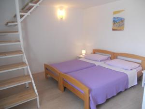 Posteľ alebo postele v izbe v ubytovaní Apartment Casa Ezio