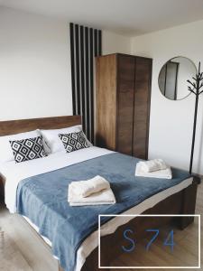 Postel nebo postele na pokoji v ubytování Apartments S73&S74 Milmari Resort, Kopaonik + 29 fotografií