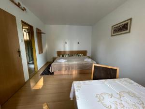 Postel nebo postele na pokoji v ubytování Privat HOTOS