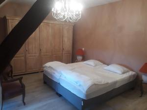 Posteľ alebo postele v izbe v ubytovaní Grand gîte au château de Betz-le-Château