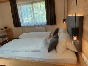 Postel nebo postele na pokoji v ubytování Haus Vilgrassa